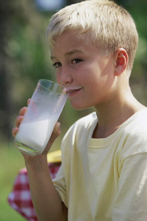 Blond Boy Drinking Milk in Charleston, WV